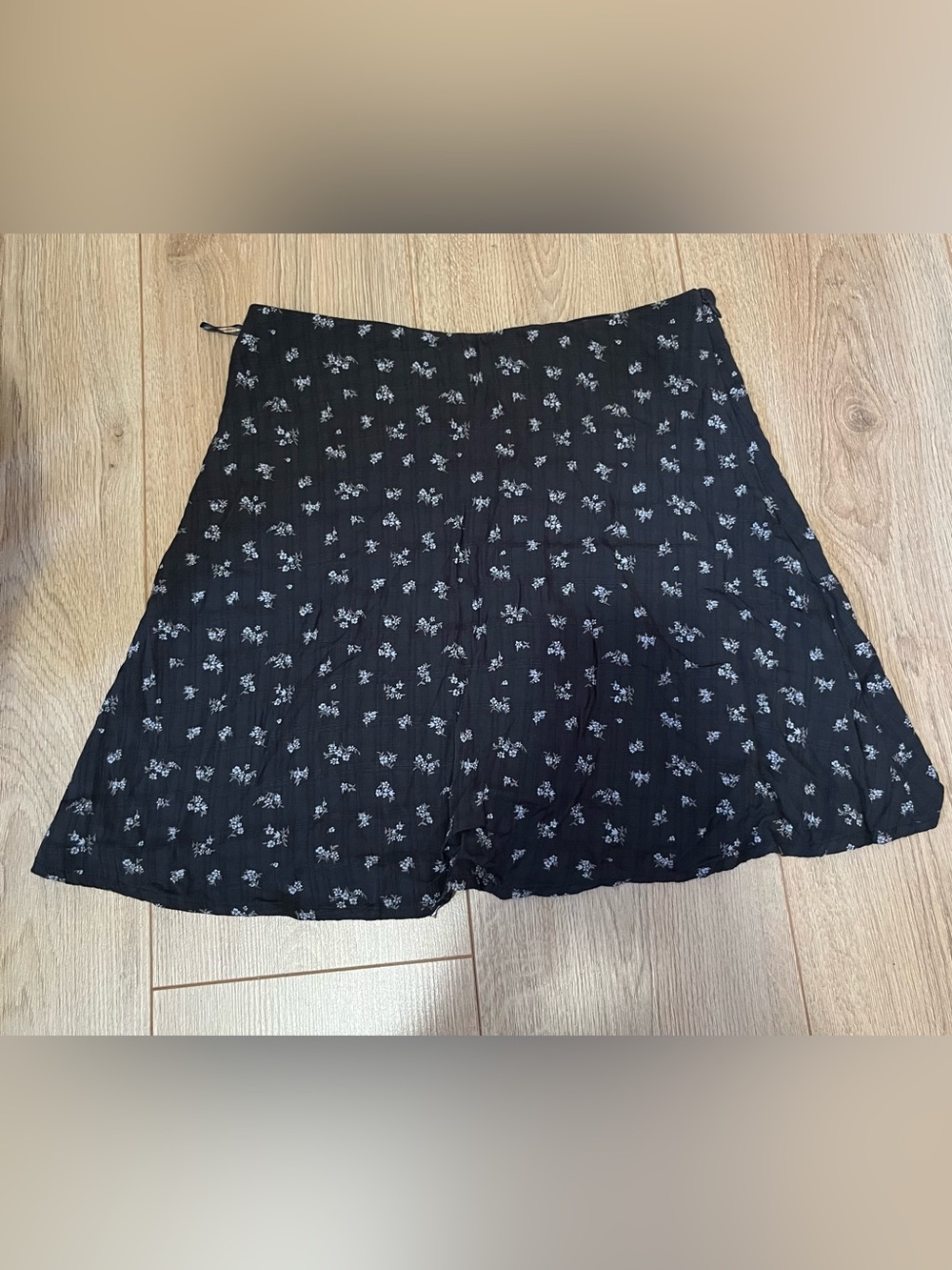 Black floral mini skirt